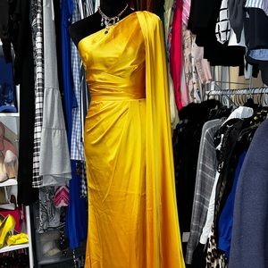 A yellow one shoulder dress never worn brand new
